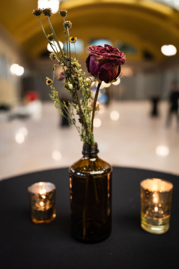 simple dried flowers in glass bottles for Union Depot cocktail table centerpieces