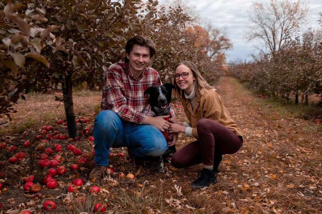 Fall engagement photo with dog in Minnesota