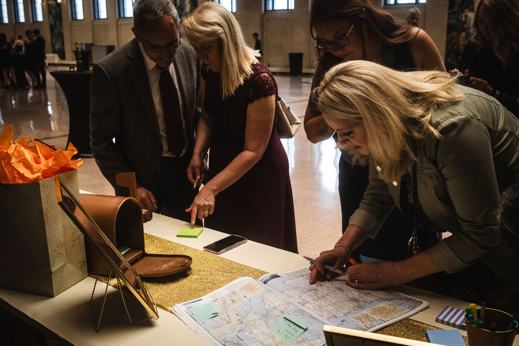 guests signing atlas guest book at Union Depot wedding