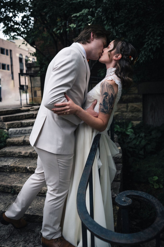 bride and groom intimate kiss outside in Minneapolis