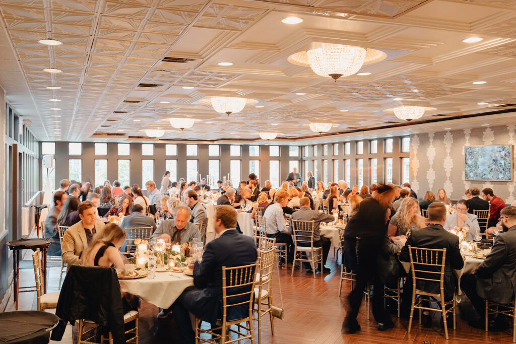 Guests seated for dinner at Van Dusen wedding reception