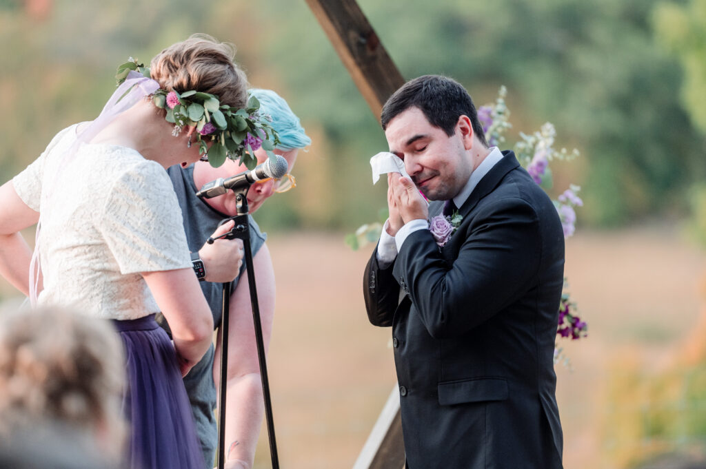 emotional groom during outdoor ceremony at Gale Woods Farm wedding 