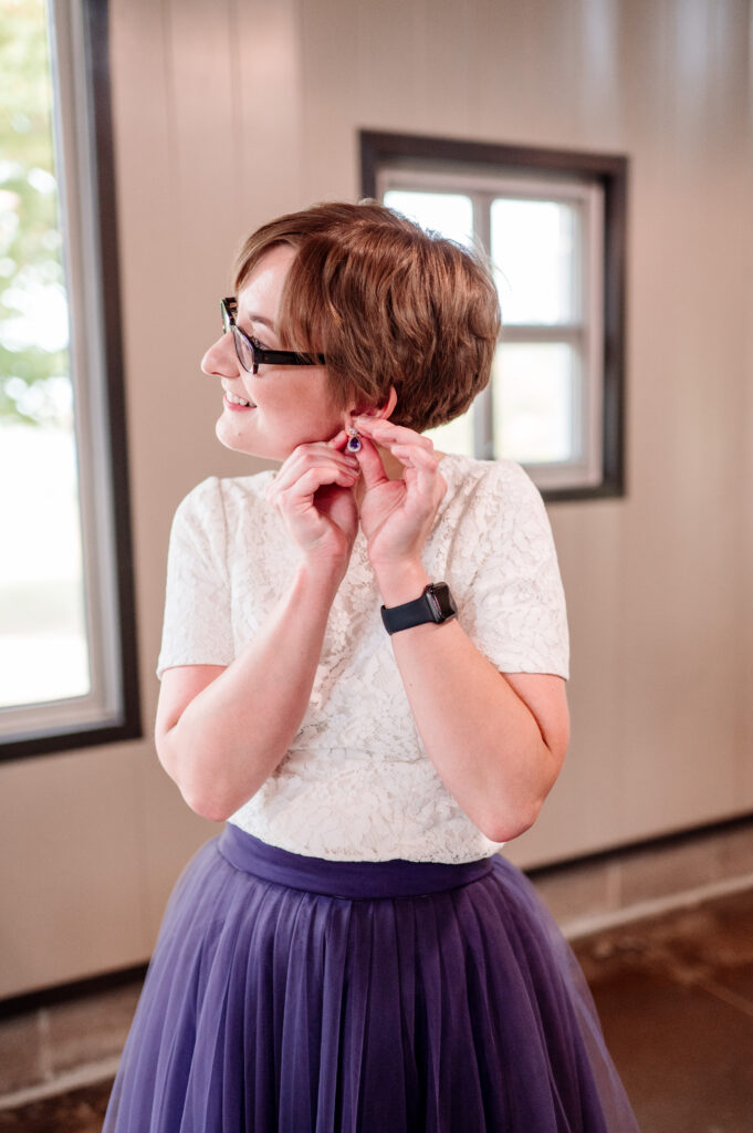 Bride getting ready putting in ear rings