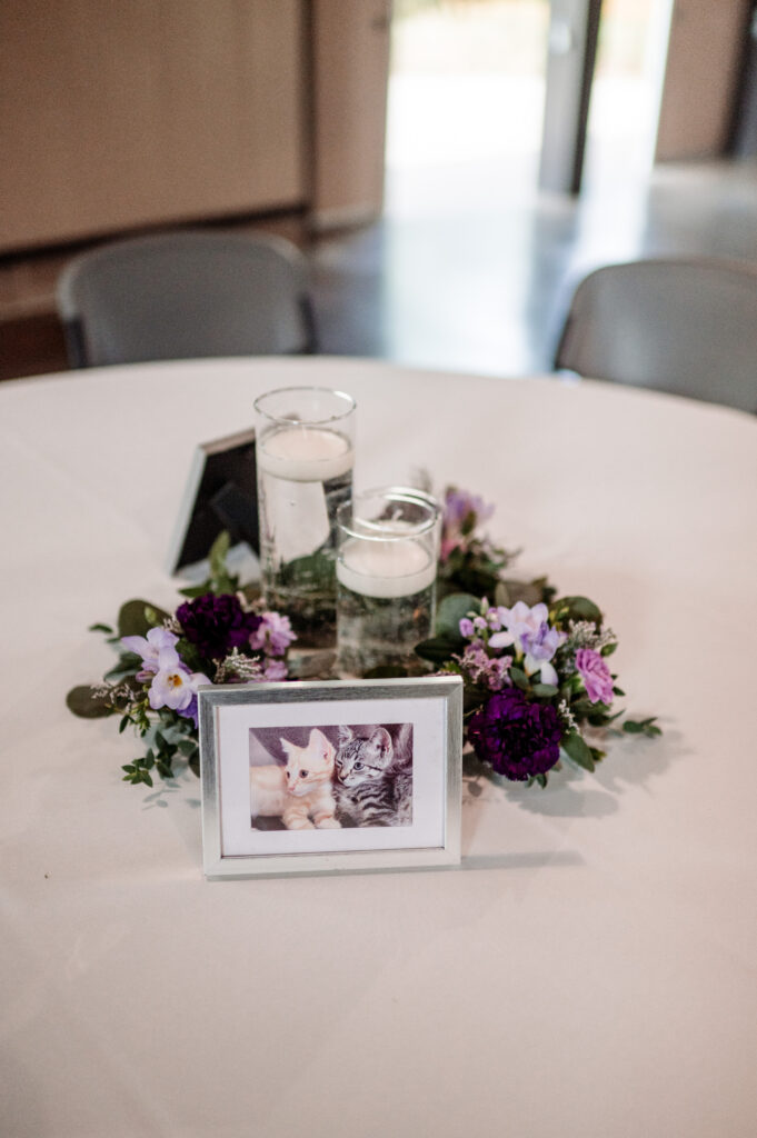 wedding reception centerpiece with cat photos