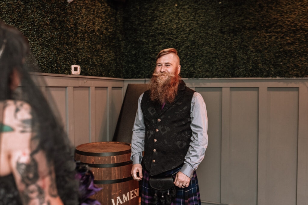 grooms reaction to first look smiling