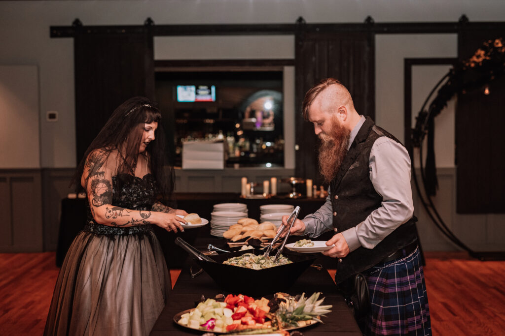 bride and groom going through Brie Cater buffet 