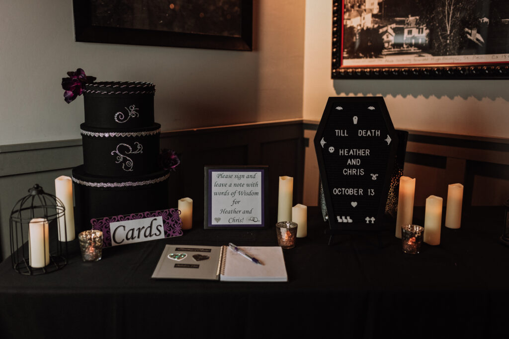 Halloween themed wedding welcome table