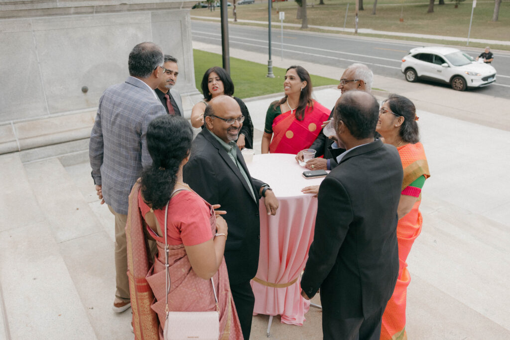 guests socializing during cocktail hour at non-traditional Indian wedding