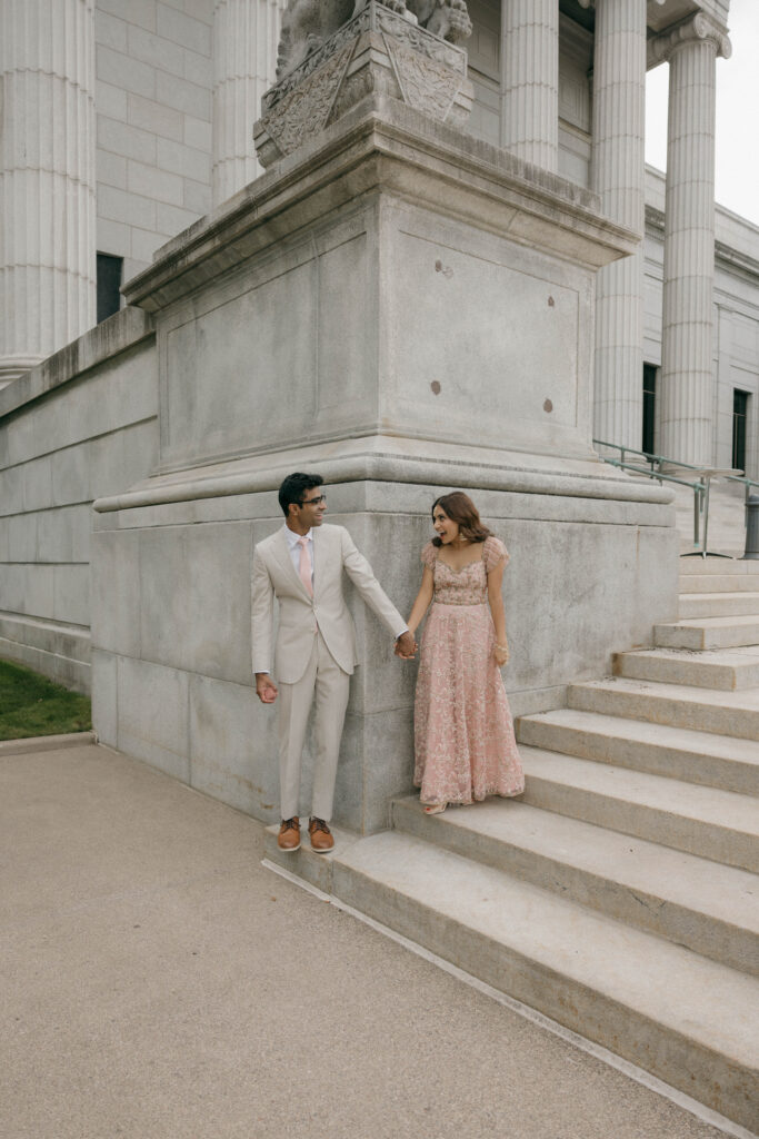 bride and groom first look reaction outside of museum