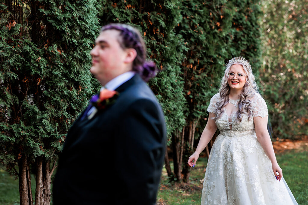 bride and groom first look at October wedding at The Gardens