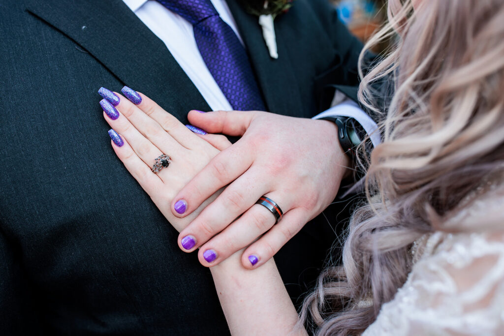 bride and groom matching manicure purple nails