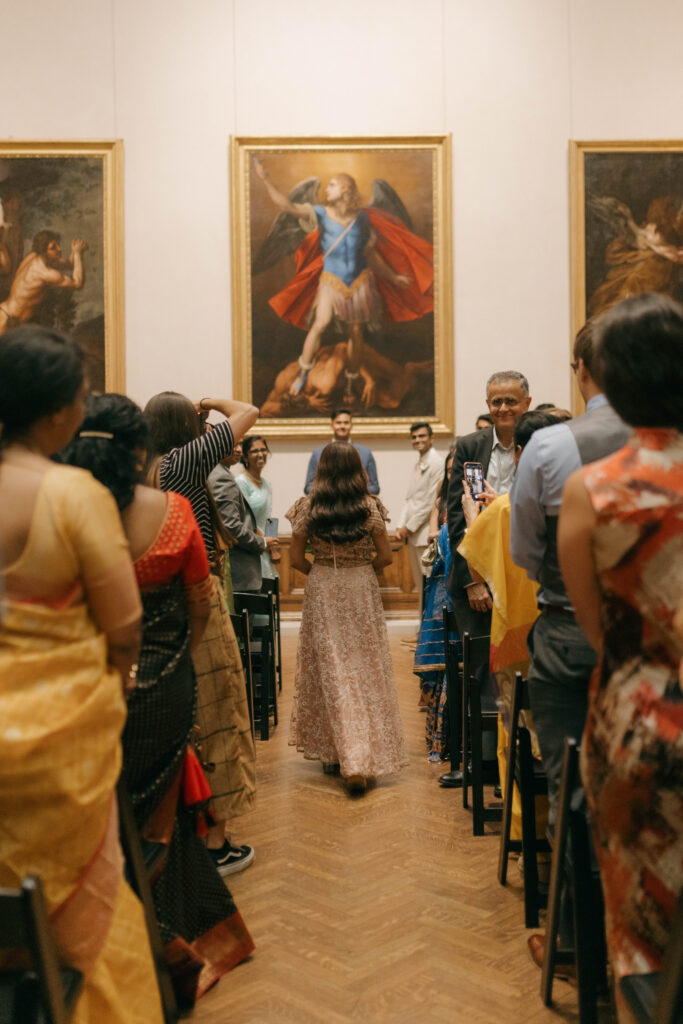 bride walking herself down the aisle for non-traditional Indian wedding ceremony