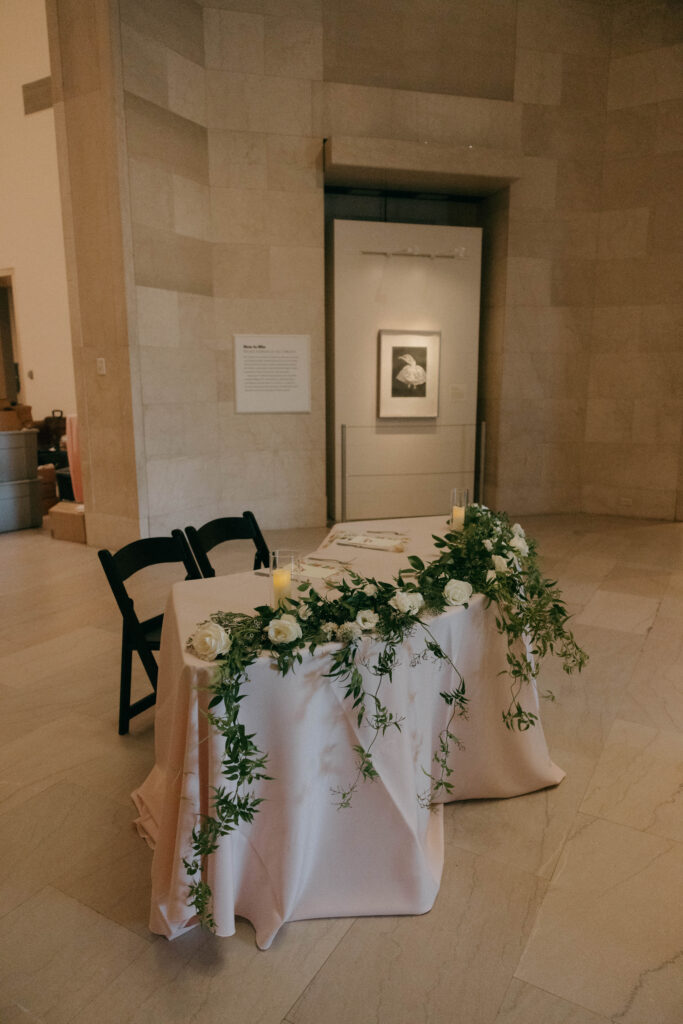 simple sweetheart table with garland decor