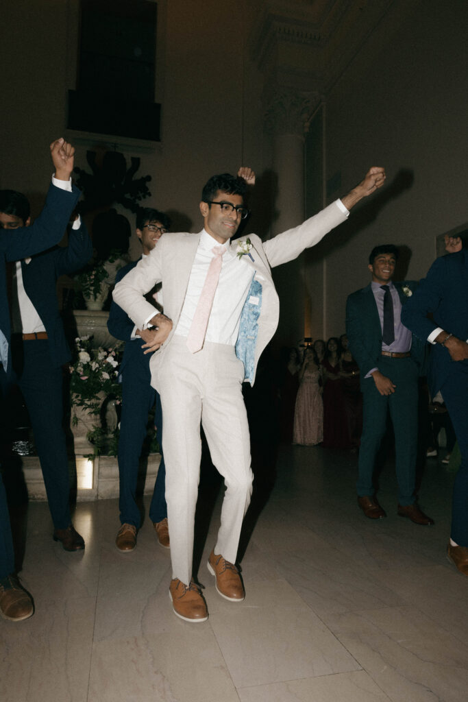 Groom and groomsmen traditional Indian wedding dance