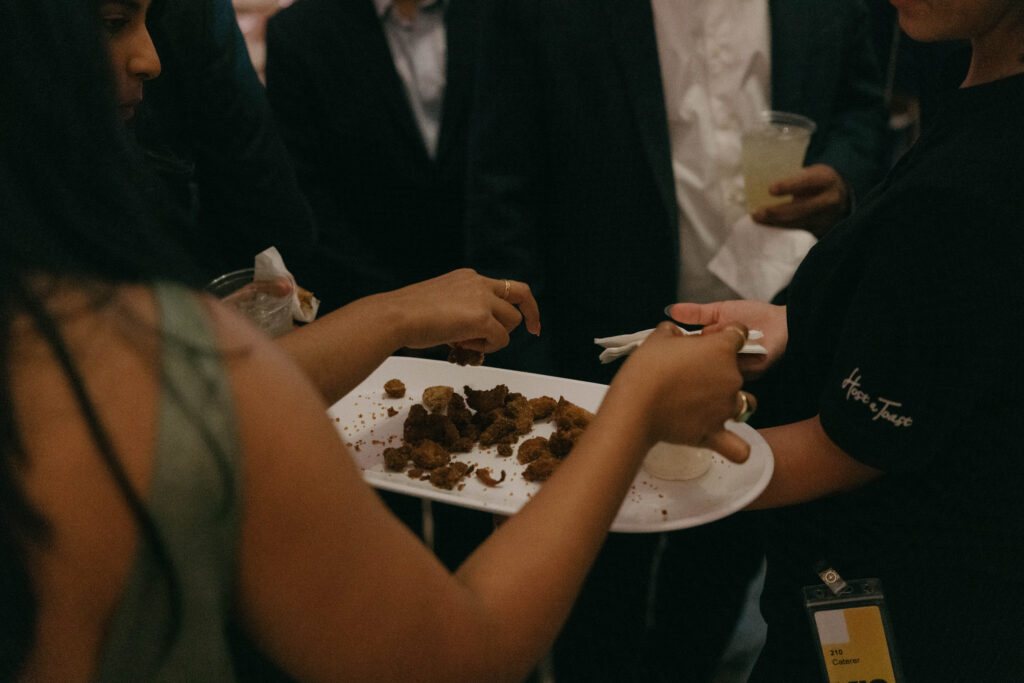 host a toast passing appetizers at art museum wedding