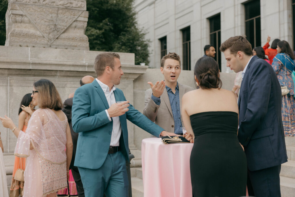 guests socializing during cocktail hour at art museum