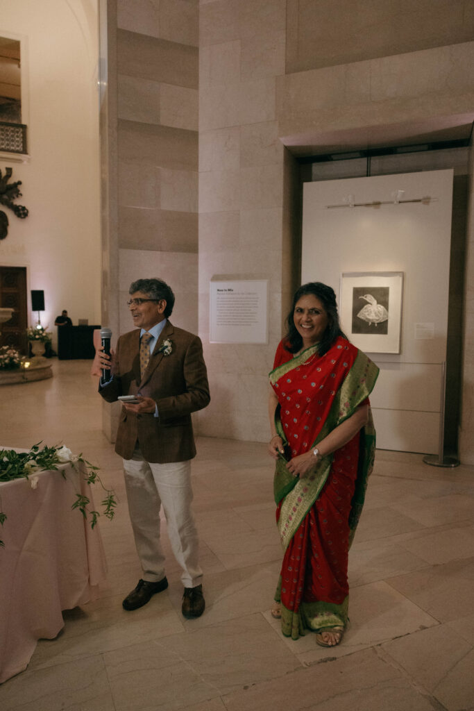 parents giving toast at non-traditional Indian wedding