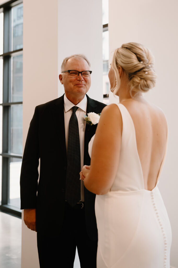 bride emotional first look with dad 