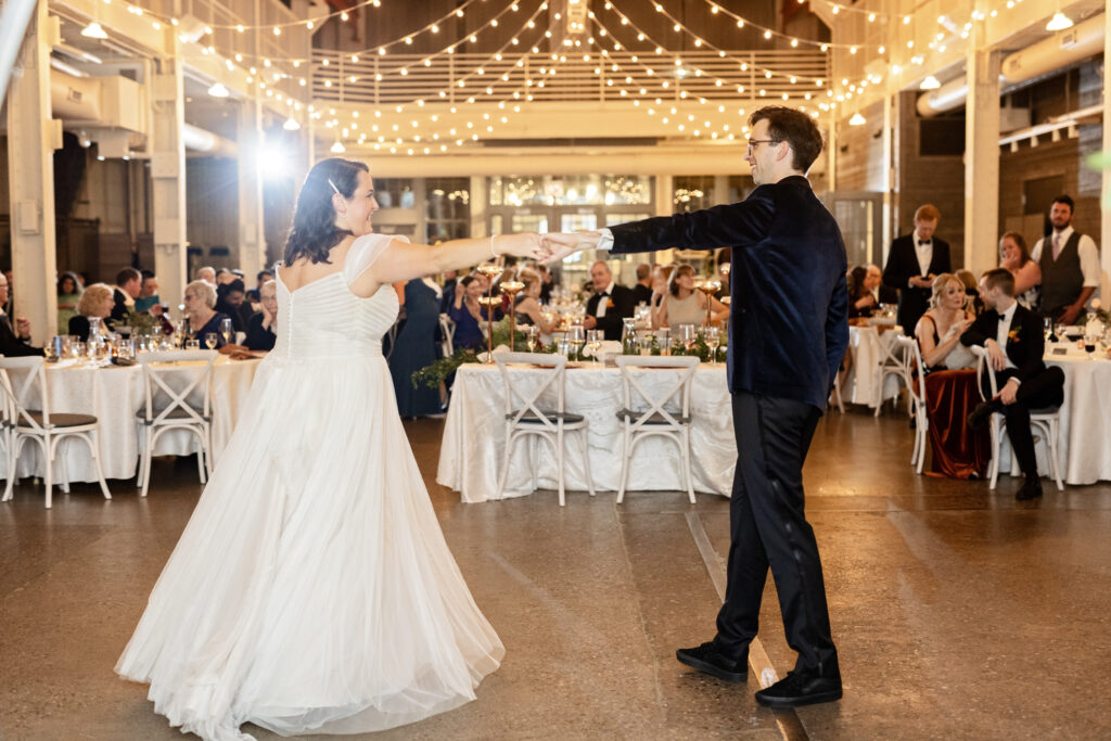 bride and groom fun first dance at Machine Shop wedding