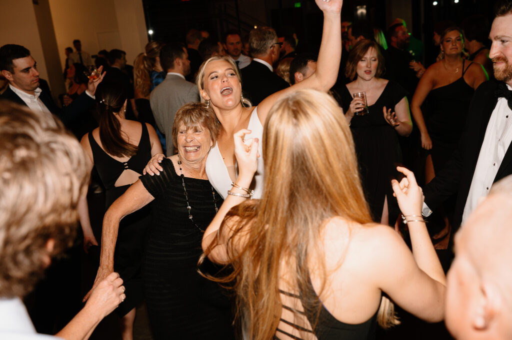 bride partying on wedding dance floor at Mosaic wedding