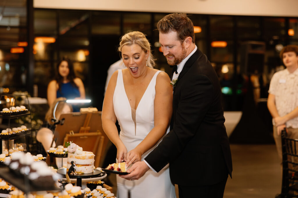 bride and groom cake cutting at Mosaic wedding