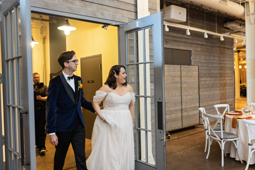 bride and groom room reveal for wedding reception at Machine Shop