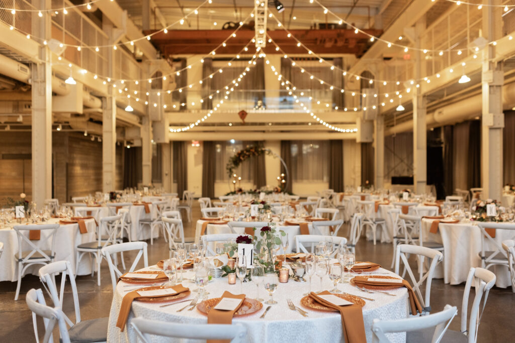 elegant reception space at Machine Shop wedding with copper and fall colors