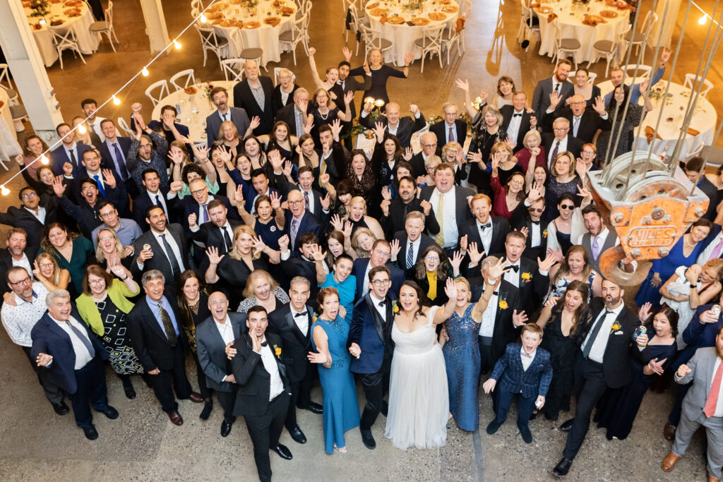 large group photo of all wedding guests at Machine Shop wedding