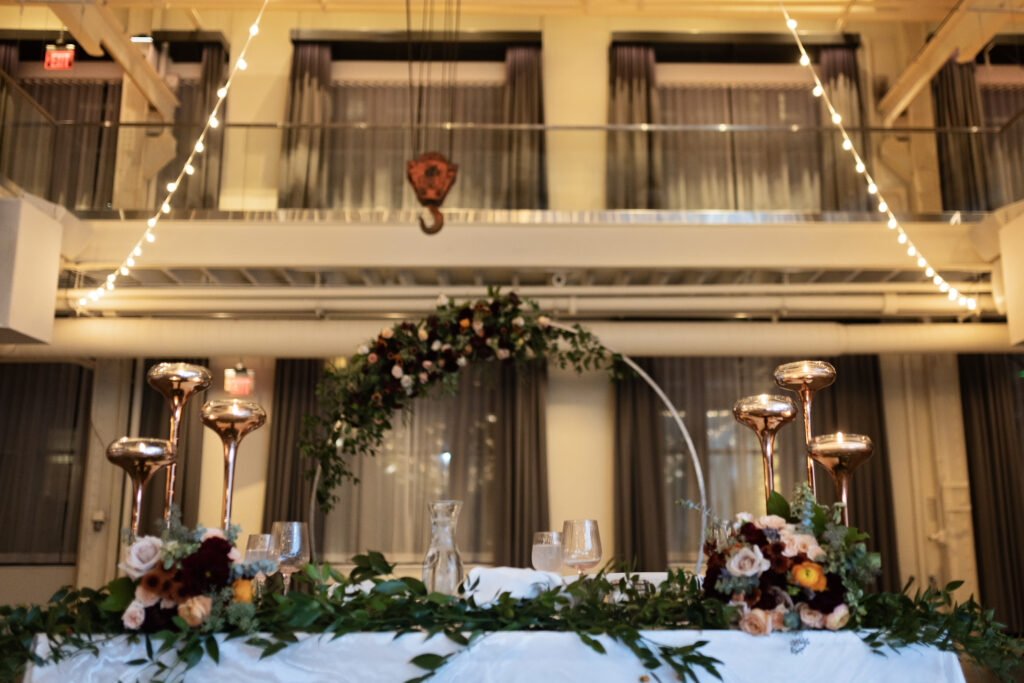 romantic sweetheart table with tall candleholders