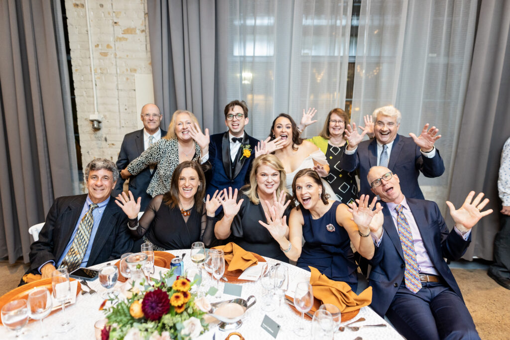 funny table dash portrait with guests at Machine Shop wedding