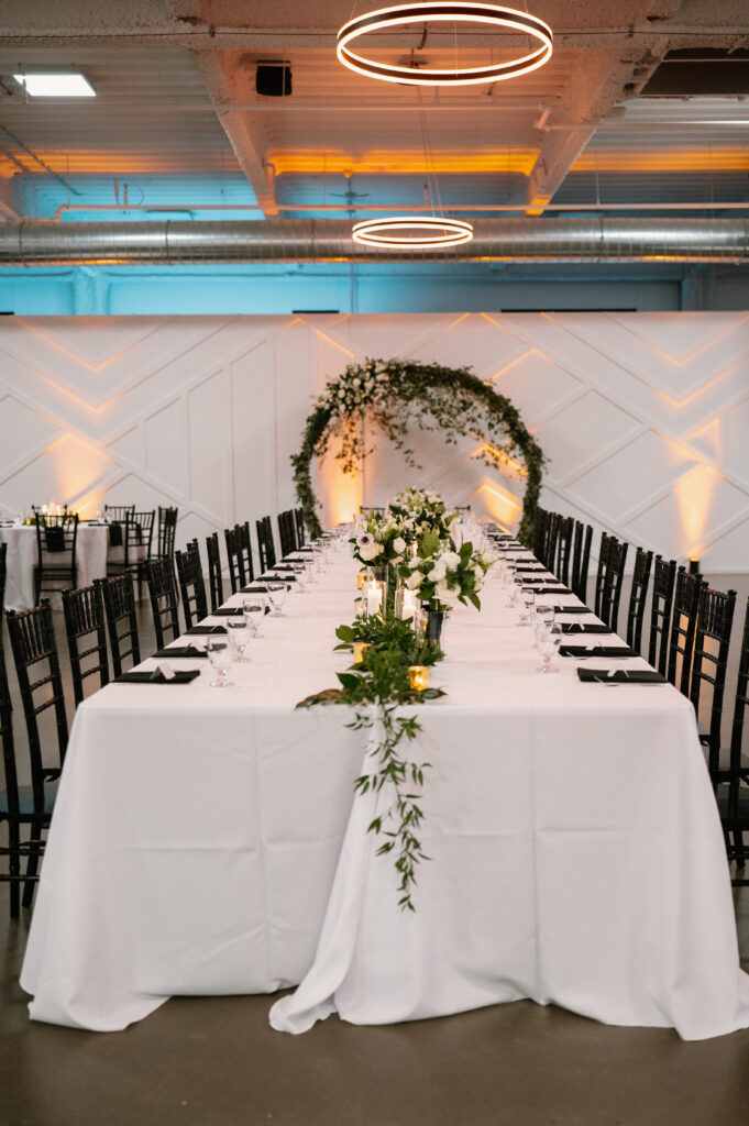 long head table with timeless decor at Mosaic wedding