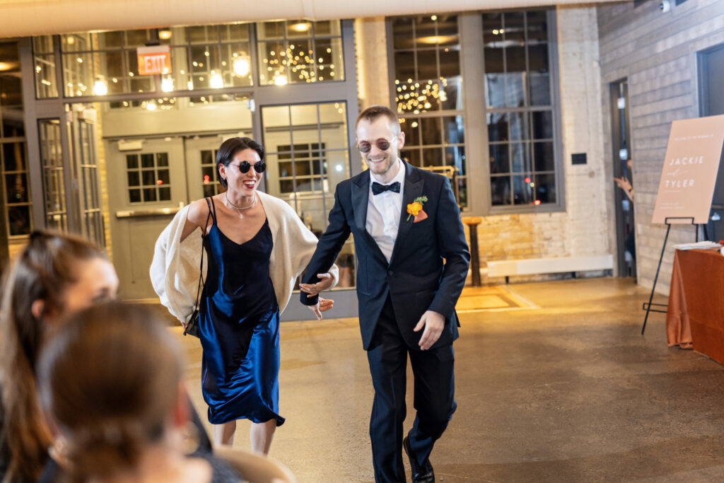 wedding party grand entrance wearing sunglasses