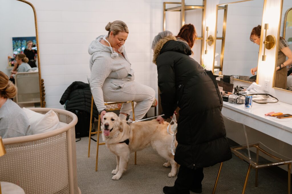 bride getting ready in Urban Daisy bridal suite