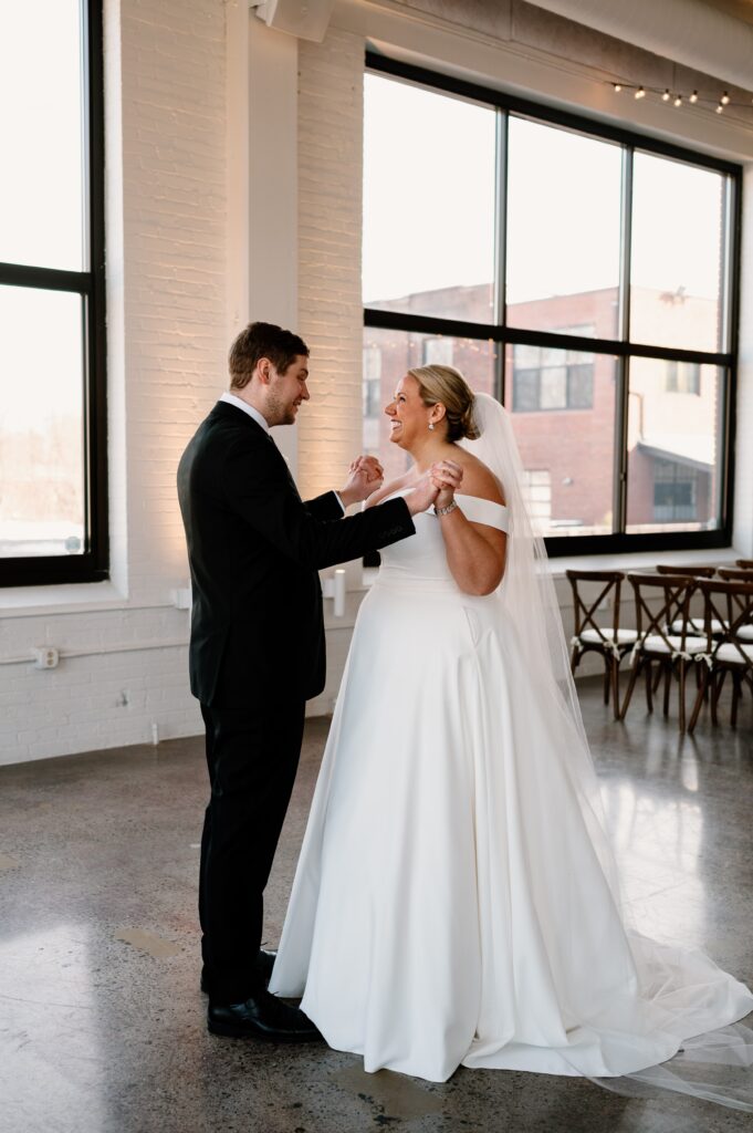 bride and groom first look reactions