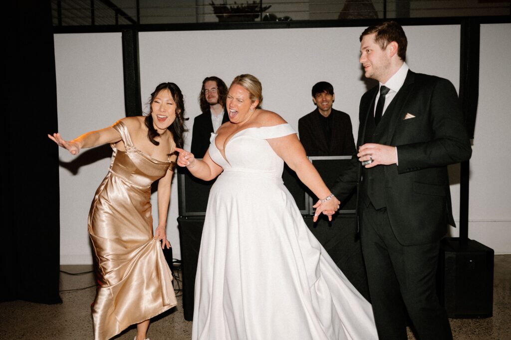 winter wedding bride on dance floor at Urban Daisy