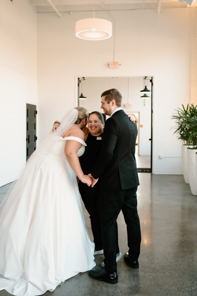 couple hugging Keyed Up Events wedding planner