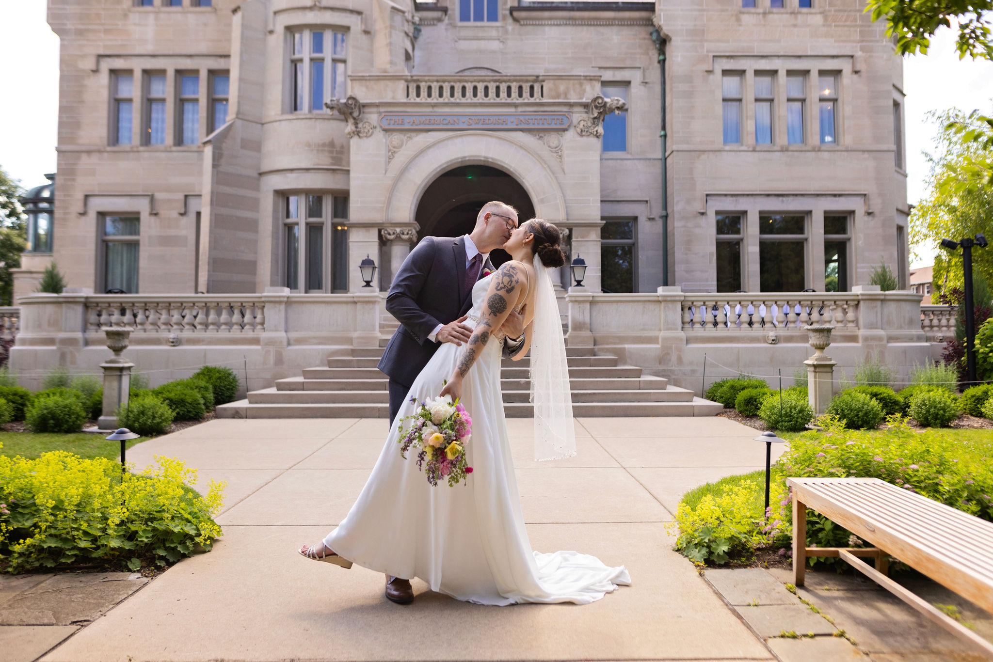 wedding couple in front of american swedish institute mansion